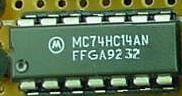 74HC14 integrated-circuit chip, plastic dual-inline package