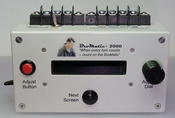 Front view of the BroMatic 2000 electronic counter showing the pushbuttons and dial.