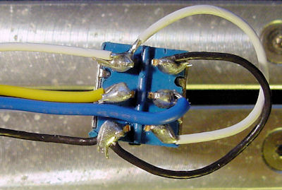 Solder the yellow and blue motor wires to the DPDT switch.