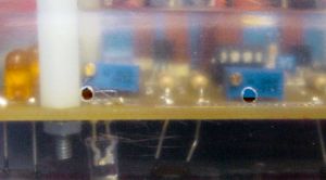 Tiny holes in the robot’s shell provide access to adjust trimpots