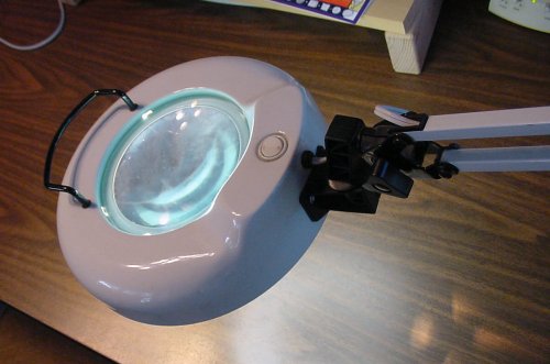 A 5-inch glass lens in a common magnifying desk lamp.