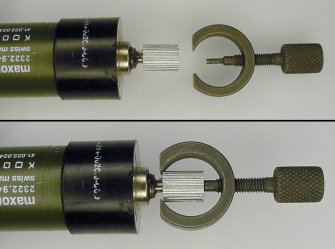Top: Motor with gear and the gear puller tool. Bottom: Removing gear by turning screw.