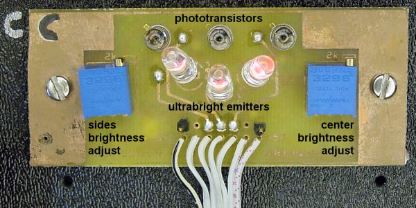 Triple floor-sensor board with three phototransistor light sensors.