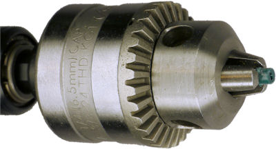 Drill chuck holding small green test point collar for hand filing