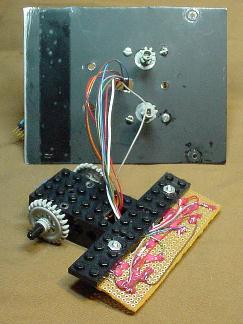 LEGO-block-based underbody and black spray-painted aluminum scoop