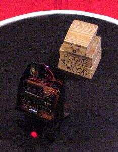 Bugdozer vs. Pound Of Wood