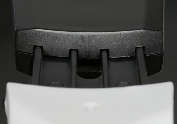 Slots and grooves in arm mount