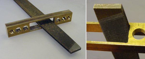 Burrs are removed and the corners are squared up using a file.