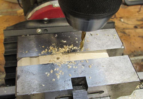 Drilling holes in bottom half of clothespin