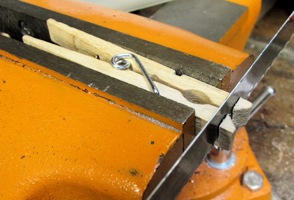 Sawing off tips of clothespin