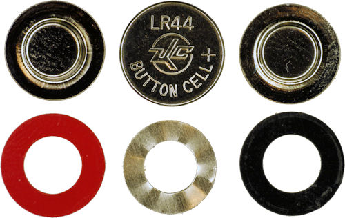 Battery contains tabs washers and individual cells