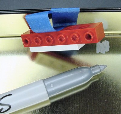 Silver coating to accept hole mark.