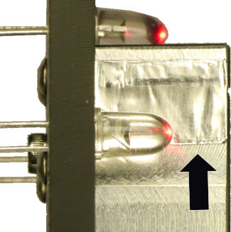 Aluminum tape seals light leakage on baffle