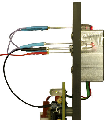 Wired socket connectors permit easy exchange of emitters and reduction in quantity