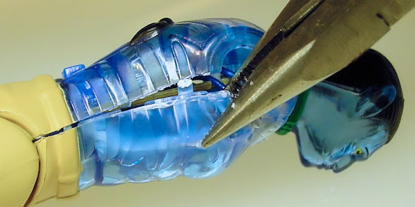 Crack toy chest open with pliers.