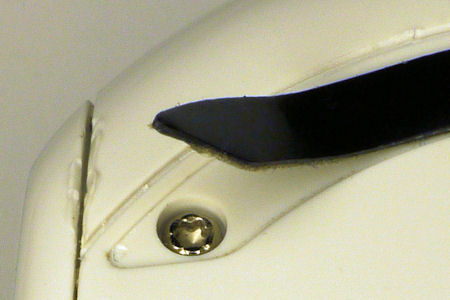 Torx screw underneath mouse glide pad