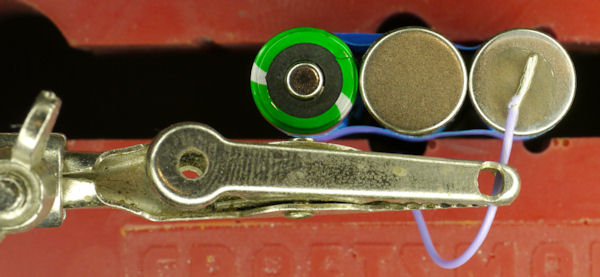 Battery with stripped wire flux and grody helping hand alligator clip