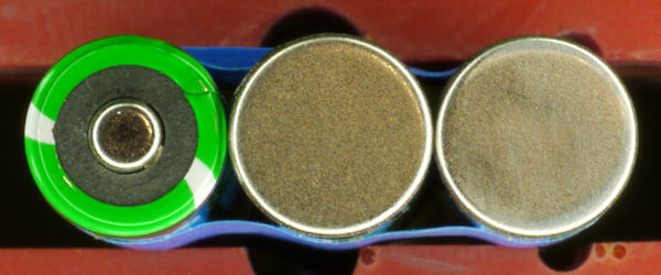 Bottom of battery sanded and cleaned with alcohol