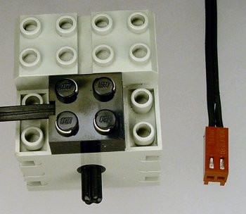 Lego motor with cable modified with a Molex KK connector to fit 0.1 headers.