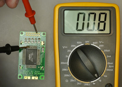 Matching connector hole with chip pin using continuity mode on a multimeter