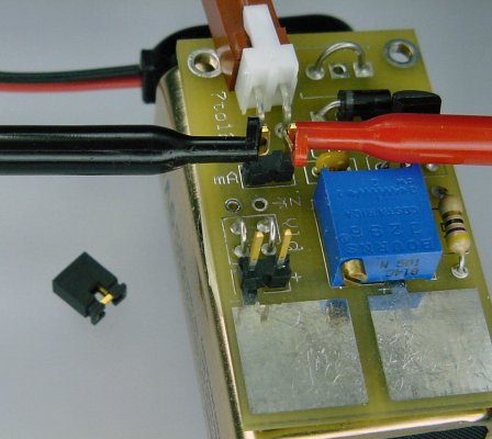 A two pin header with the shorting jumper removed makes it possible to measure the current passing through using a multimeter.