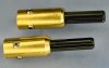 A pair of couplers for Lego wheels and gears