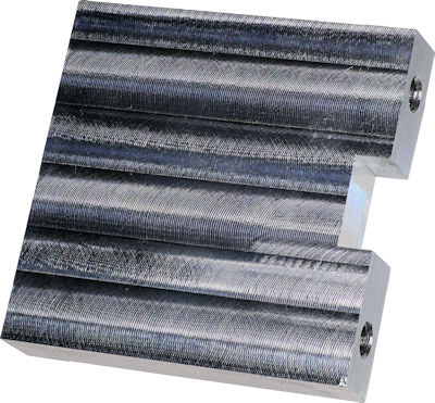 Target bracket spacer machined from aluminum
