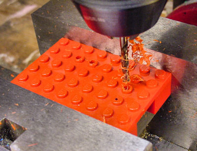Drilling 1 8th holes in Lego plate for wires