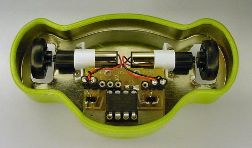Monkey Mints robot shell with motors and a motherboard.