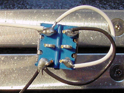 Solder the black (power negative) wires to the DPDT switch.