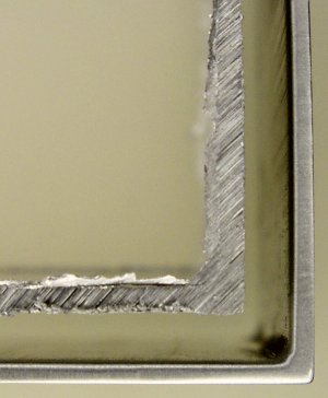 The freshly cut edge of angle stock may be rough. Mill and grind (or sand) to make a nice clean edge.