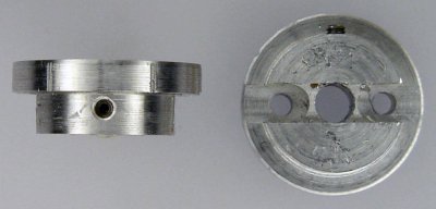 Single piece Maxon-motor-to-LEGO-wheel coupler made of solid aluminum on a lathe and milling machine.