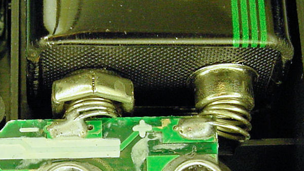 Soldered battery springs in a multimeter