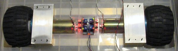 Wheels attached to gearmotors with non-geared output shaft containing encoder discs.