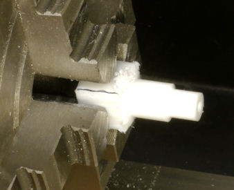 Diameter reduced and large end hole drilled