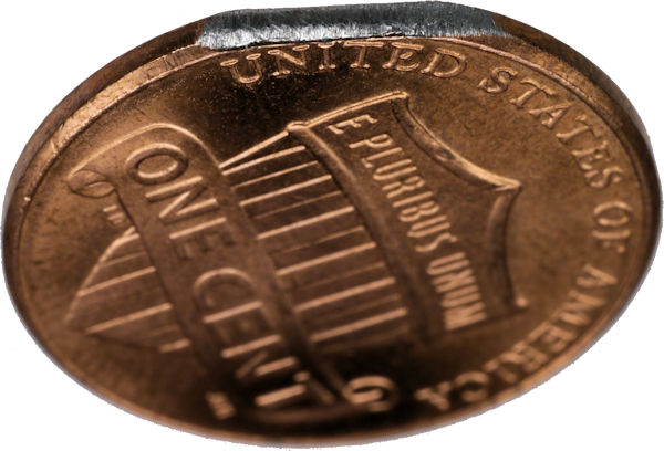 Sand new penny to expose zinc