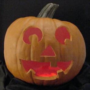 Pumpkin lit with red LEDs instead of a candle.