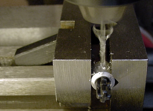 Drilling set screw hole with cross axle in place