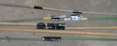 Awful photograph of bamboo poles connected together with duct tape