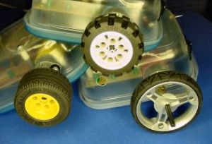 Three different LEGO wheels