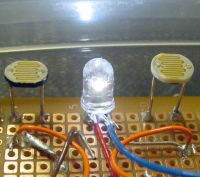 White LED as a headlight between photoresistors