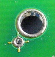 Screw hole and alignment crosshair