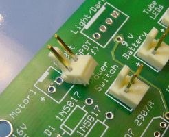 Friction lock of header must face the rear of the board, matching the silkscreen illustration on the board