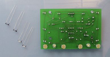 Photoresistors inserted on opposite side of board from the majority of the components