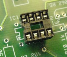 Rounded notch on one end of the socket matches silkscreen illustration. In order to view the silkscreen in this picture, the socket was moved too far to the right to be inserted.