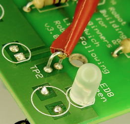 A loop of wire makes it easy to secure an IC hook test lead probe.