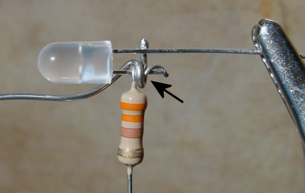 Solder wrapped around intertwined component leads