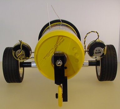 This is a three-wheel robot with an unpowered third-wheel on the rear for balance.