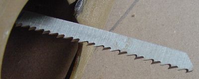 Smooth cut scroll blade