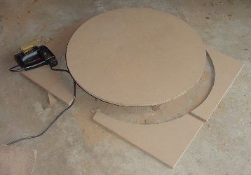 Finished circle with four pieces cut off along the way